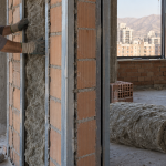عایق صوتی ساختمان؛ اجرای دیوار مشترک، کف و تأسیسات + نکات نظارتی